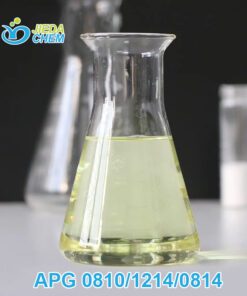 Clear viscous APG (Alkyl Polyglucoside) surfactant in glass measuring cup, natural origin plant-based ingredient