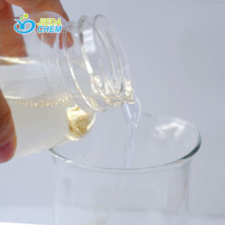 Pour the pale yellow CAB/CAPB from the small bottle into the beaker