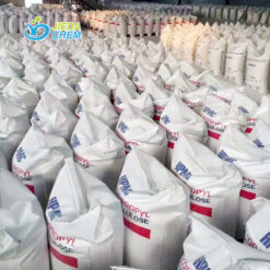Multiple 25kg HPMC plastic woven bags stacked