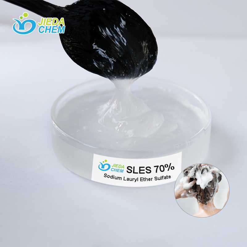 Close-up of SLES (Sodium Laureth Sulfate) liquid surfactant on transparent dish with spoon demonstrating viscosity and texture