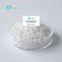White needle-shaped Sodium Lauryl Sulfate (SLS) 92% in a glass dish, product of JIEDA CHEM, made in China