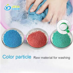 The Color speckles of blue, green and red in a small plate, with the background picture of washing clothes