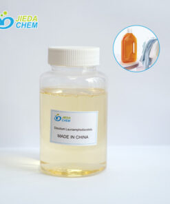 The transparent liquid disodium lauroamphodiacetate placed in a small bottle