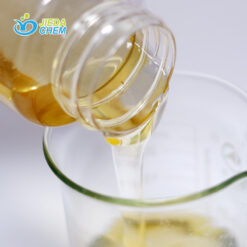 Pour the pale yellow liquid disodium cocoamphodiacetate from the small bottle into the beaker