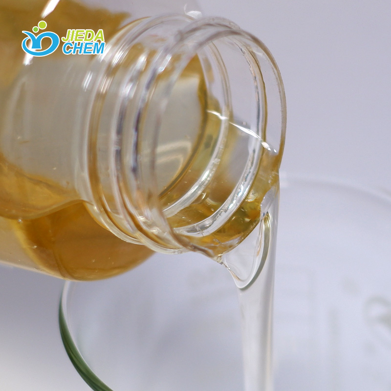 The yellow liquid Olive Oil Peg-8 Esters contained in the small bottle is being poured into the beaker