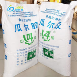 Two 25kg woven bags of Guar Gum powder in a warehouse