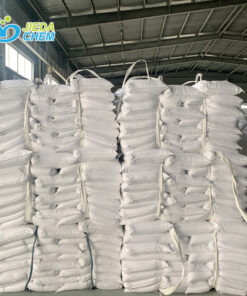 Packed white bags of calcium carbonate