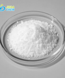 Top-view of white crystalline Caprylhydroxamic Acid powder in petri dish